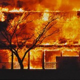 $50,000 punitive damages for refusing to pay a fire loss.